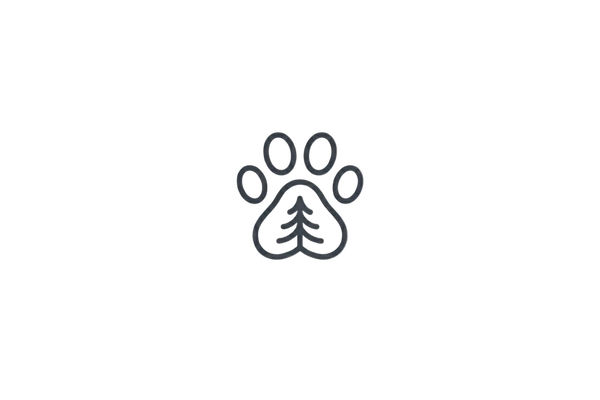 Paw print icon with a tree inside on a white background